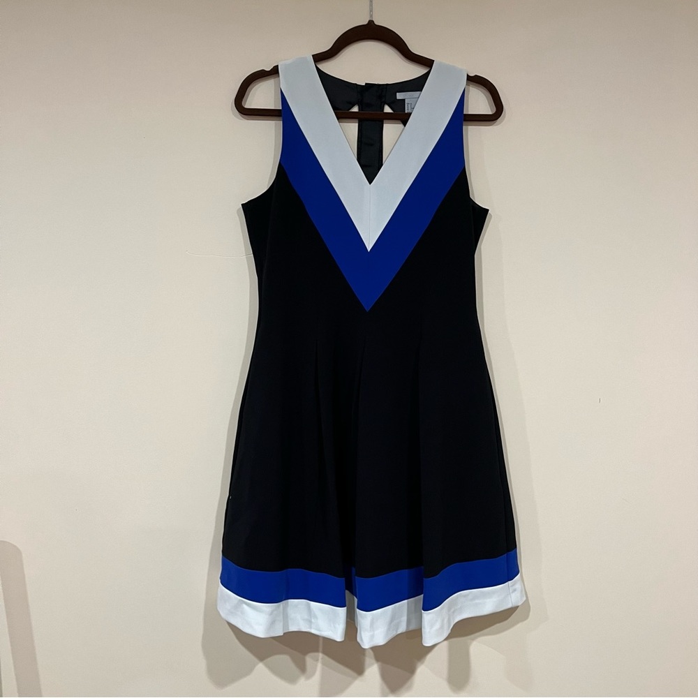 black v neck dress with blue and white striped detail